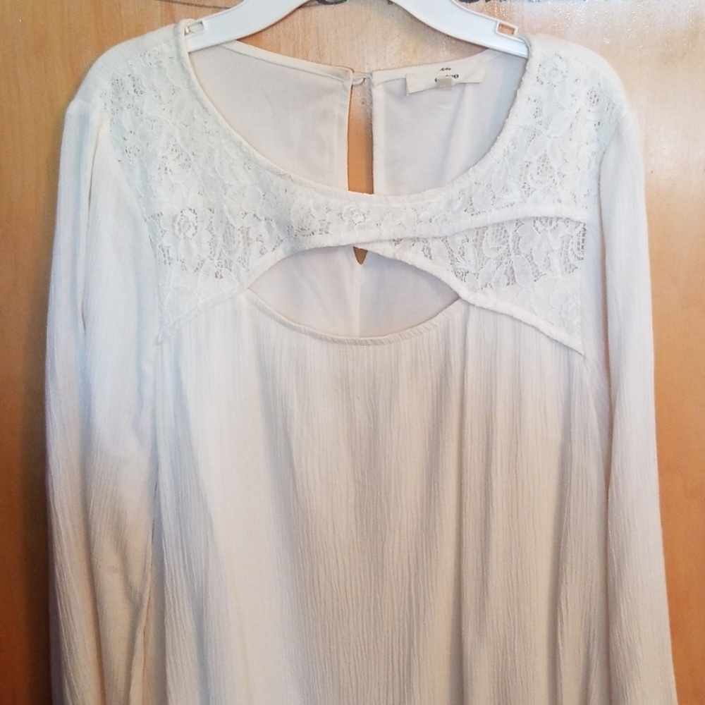 Cream long sleeved dress. Size large.